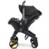 Découvrez le Doona Siège-auto & poussette noir 2en1 sur BebeMaman.ma. Ce système révolutionnaire combine un siège-auto et une poussette, offrant praticité et sécurité pour votre bébé. Achetez-le dès maintenant !