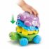 Stimulez la motricité et l'apprentissage de votre bébé avec VTech Famille Empilo Tortue - Jeu Éducatif Empilable ! Jouet 4-en-1 : empiler, tirer, compter et jouer en toute sécurité dès 12 mois.