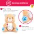 Apaisez votre bébé avec l’ourson veilleuse 2-en-1 Winfun : peluche douce + projecteur ciel étoilé + musique apaisante. Dès la naissance.