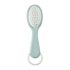 Peigne + brosse Béaba bleu/vert : poils en nylon ultra‑doux, peigne antinœuds, manche ergonomique, anneau suspendable. Dès la naissance, prise en main facile.