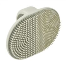 Brosse de bain Béaba en silicone Vert‑de‑gris – double texture douce nettoyante et apaisante, ergonomique, idéale pour cradle cap, antidérapante.