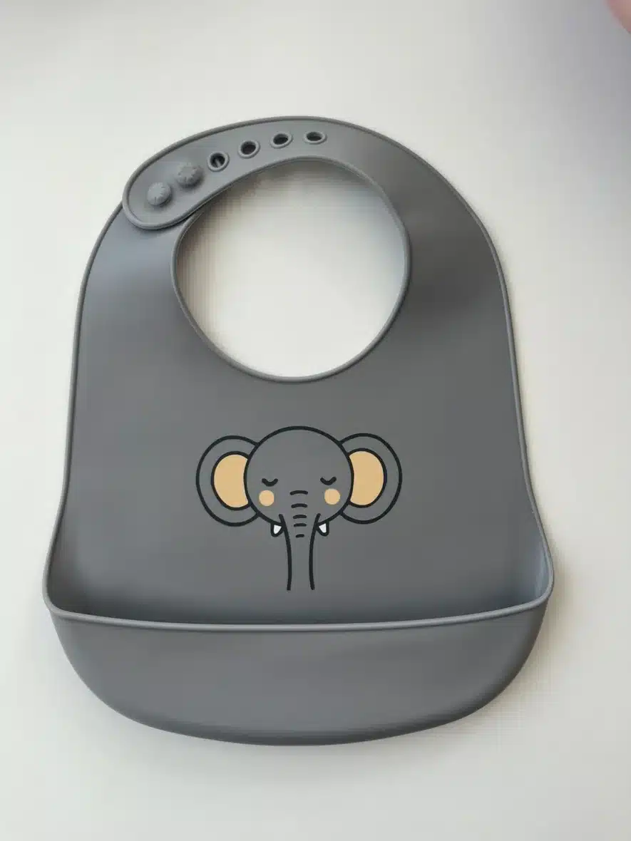 Yummy Bavoir en silicone avec poche Elephant 9m+ Gris