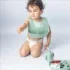 bavoir en silicone avec poche vert pastel
